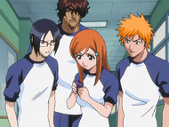 Orihime holding Tatsuki's wristband.