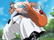 Orihime is injured and sent flying by a backhand from Yammy.