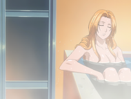 Rangiku bathes at Orihime's apartment.