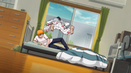 Isshin falls out a window.