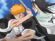 Ichigo catches Byakuya's attack from behind.