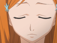 Orihime is disheartened by her lack of power.