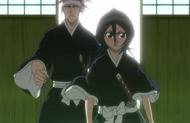 Rukia and Renji Abarai emerge from a Senkaimon.