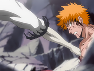 Ulquiorra stabs Ichigo in the chest with his hand.