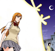 Orihime emerges from the Visored warehouse.