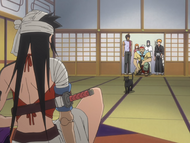 Uryū and his friends meet Kūkaku for the first time.