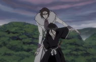 Muramasa grabs Rukia's arms.