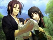 Itazura as a baby, with his mother and father.