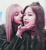 Lisa kissing Jennie