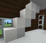 The stairs in the modern house 3 in Greenville made of blocks of quartz and white concrete