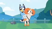 Mia gives Bluey a piggyback.