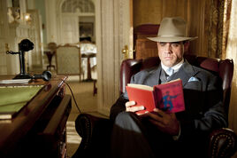 Gyp at Nucky's desk