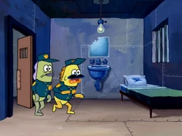Dos guardias de la prisión descubren que Plankton se escapo.