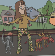 A young Esther with Vladikus and a knight puppet.