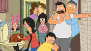 Gayle forcing a kiss on Mort during a Thanksgiving catastrophe. ("Turkey in a Can")