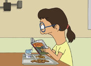 Kaylee reading The Squire in the Mire at lunch. ("A Fish Called Tina")