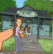 The inside sleeve shows her holding a guitar outside Treasures o' the Tide