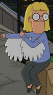 Jodi donning angel wings for the winter holiday Thundergirls play. ("The Plight Before Christmas.")