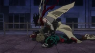 Stain saves Izuku from a nomu.