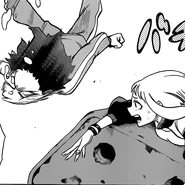 Ochaco stops Izuku from hitting the ground.