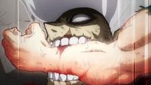 Tomura bites Izuku's arm