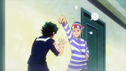 Yuga scolds Izuku for the mess he caused.