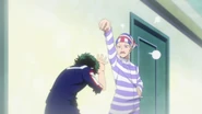Yuga scolds Izuku for the mess he caused.