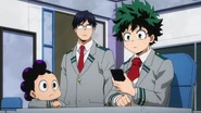 Izuku, Tenya and Minoru watching the news about Deika's destruction