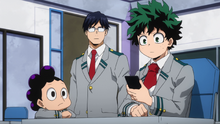 Izuku, Tenya and Minoru watching the news about Deika's destruction