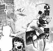 Kyoka attacks Izuku with Heartball Wall.