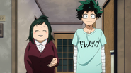 IZuku and Inko welcoming All Might at their home.