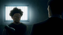 Akira being interrogated
