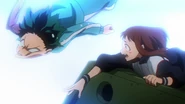 Ochaco saves Izuku from falling.