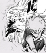 Ochaco distracts Katsuki with her jacket and sneaks behind him.