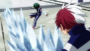 Izuku avoids Shoto's ice.