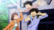 Kota's parents in civilian attire.