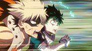 Izuku and Katsuki charge at Nine.