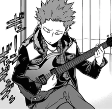 Soga tunes Tamao's guitar