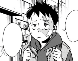 Koichi with the face slapped.png