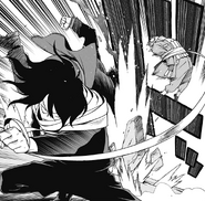 Shota moves away the Villain from Endeavor.