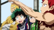 Eijiro explains his quirk to Izuku and Class 1-A.