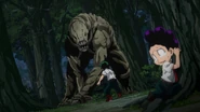 Izuku stands up to the dirt monster.