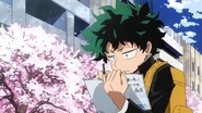 Izuku taking notes on Kamui Woods, Mt. Lady and the Giant Villain.