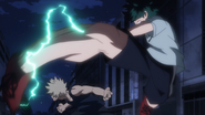 Izuku Midoriya kicks Katsuki Bakugo in the face