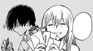 Rei holding up Shoto's letters.