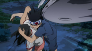 Yosetsu attempts to protect Momo.