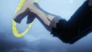 Izuku is cornered by Tomura's onslaught of attacks.