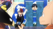 Tenya and Shoto pose in a face board