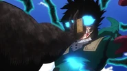 "Tomura" finally manages to put one of his hands on Izuku's face..