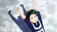 Izuku stretching in Season 2's "Peace Sign" opening.